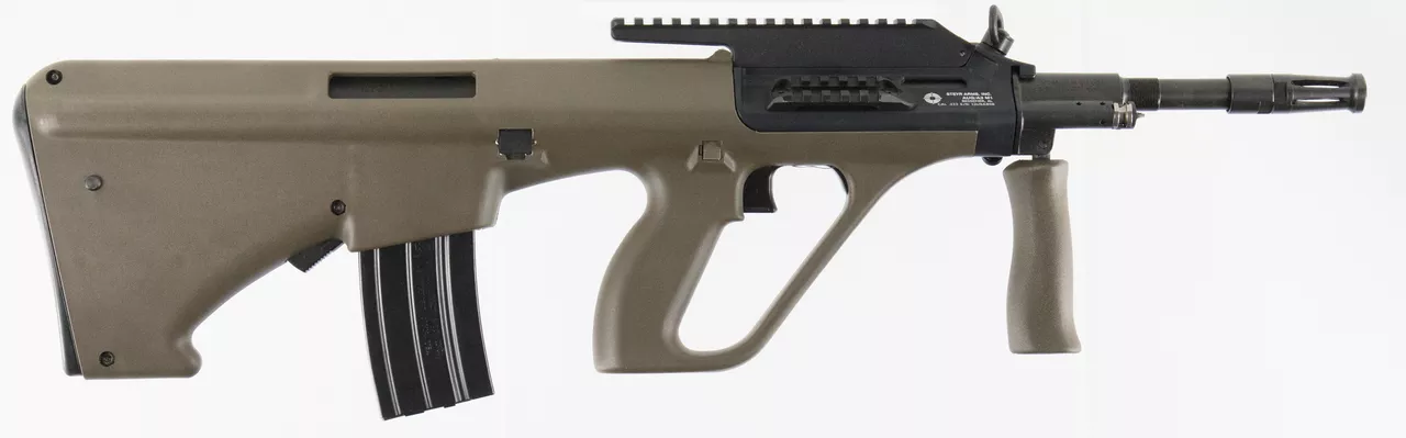 Steyr AUG A3 M1 with Extended Rail 223 Remington/5.56 NATO 16.375″ Barrel, Polymer Bullpup Olive DrabGreen Stock Black, 30rd